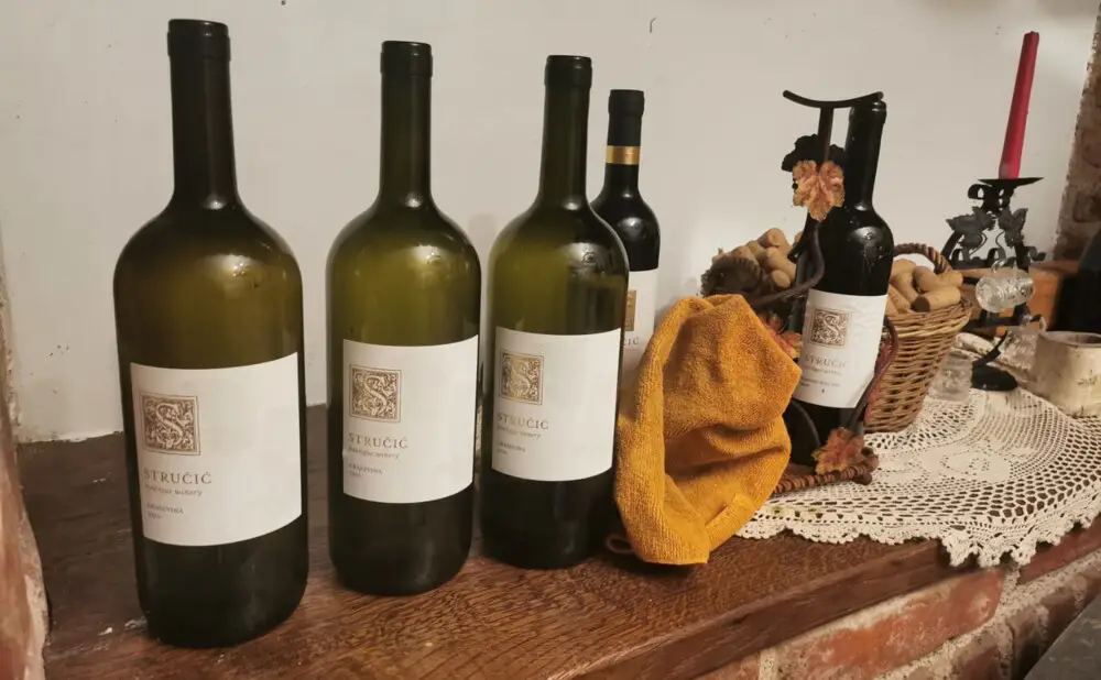 A detail of a bottle of Rajnski Rizling (Rhine Riesling) from the Stručić winery during an expert wine tasting.